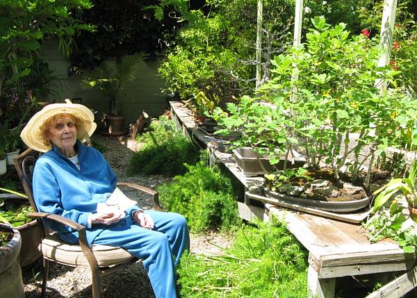 Gloria in her garden